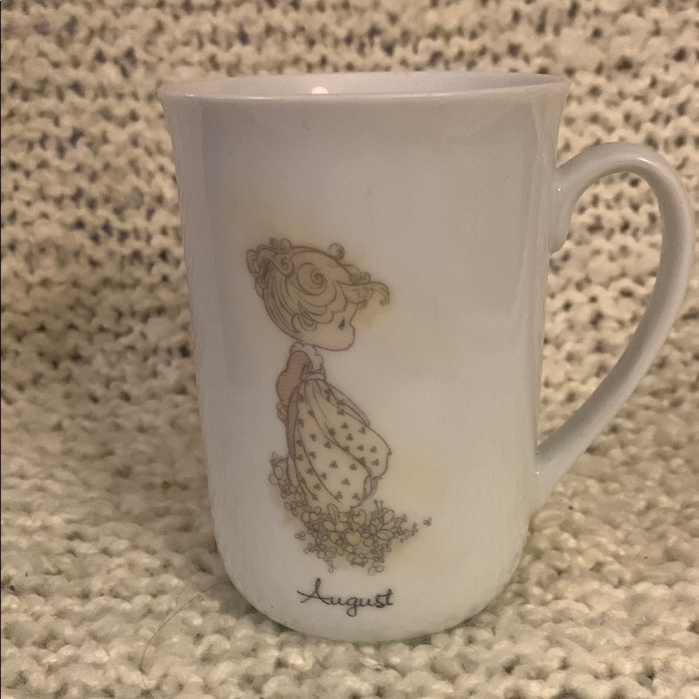 August Precious Moments ceramic tea or coffee mug from 1983.